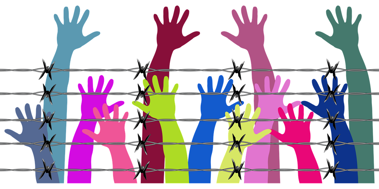 Tekening van handen en armen achter prikkeldraad