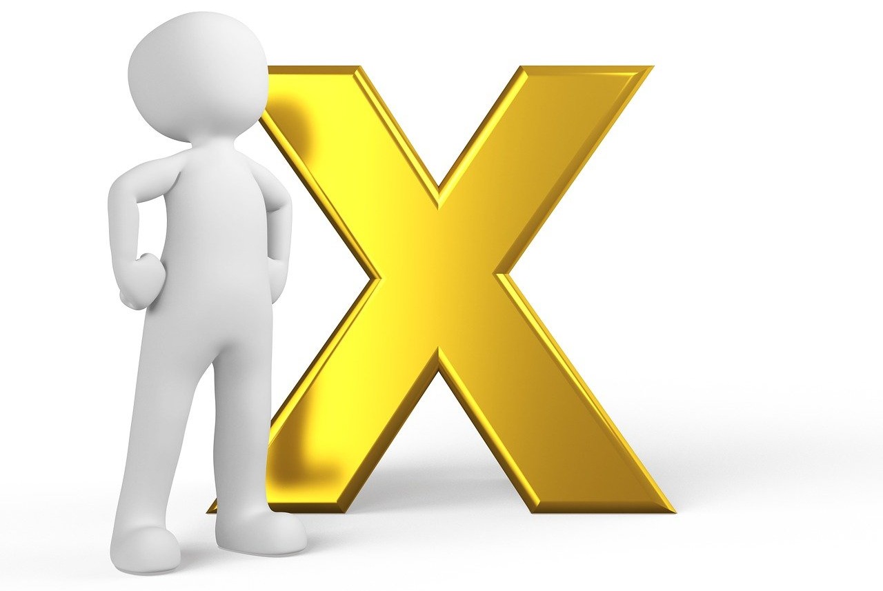 Getekend poppetje naast letter X