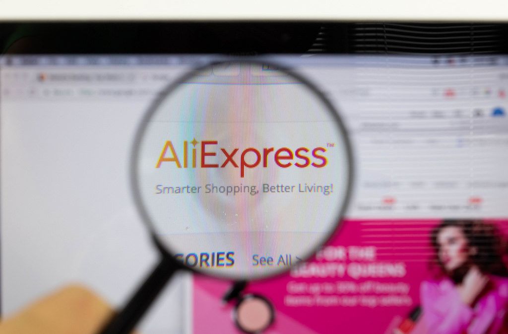 aliexpress logo on a computer screen with a magnifying glass 1
