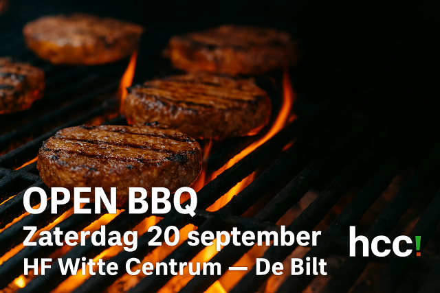 BBq met vlammetjes en hamburgers er op