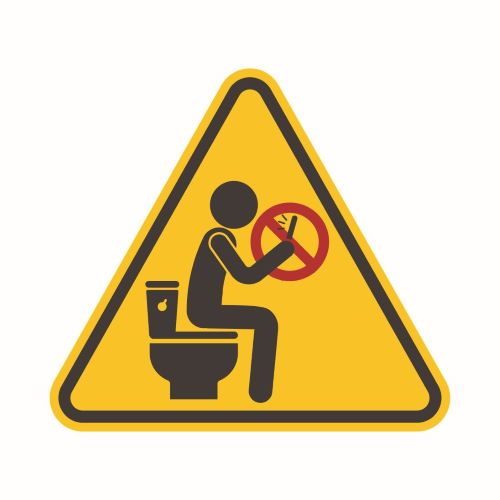 geen smartphone op toilet bord