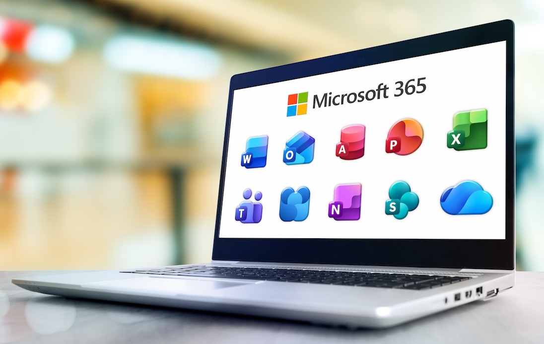 Laptop met op scherm alle icoontjes van MicroSoft Office