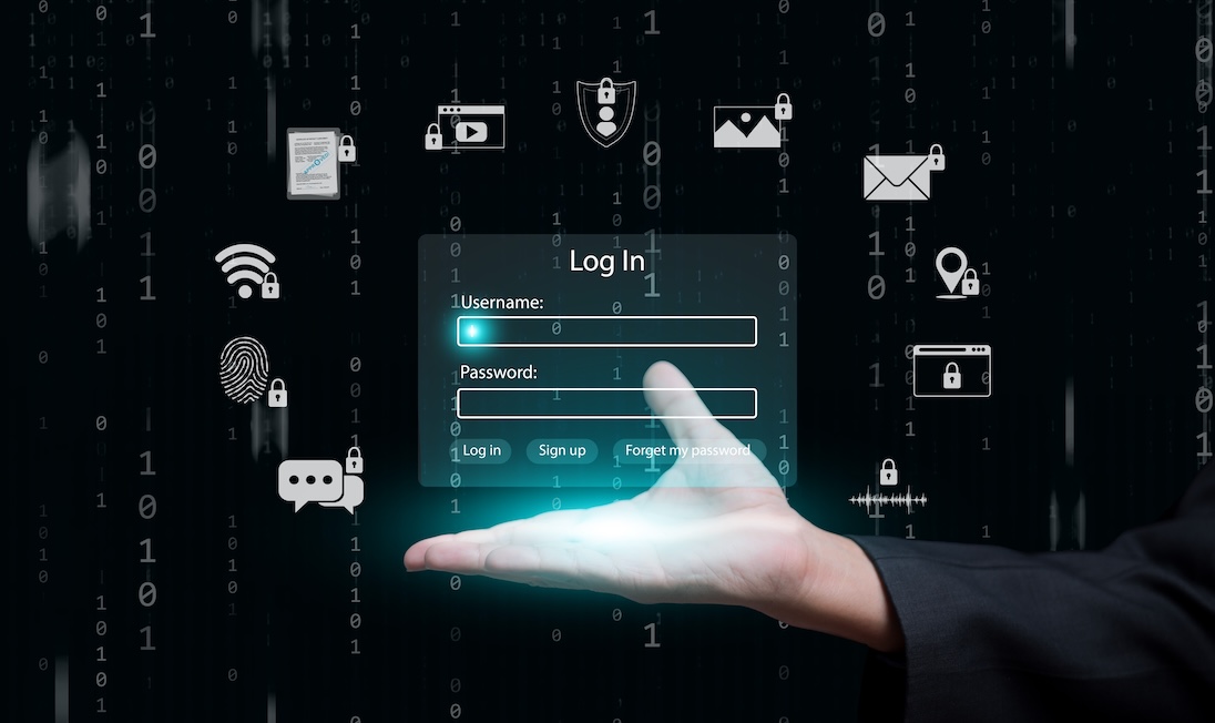 Hand met inlogscherm van een site en allerlei icoontjes die met internet veiligheid te maken hebben